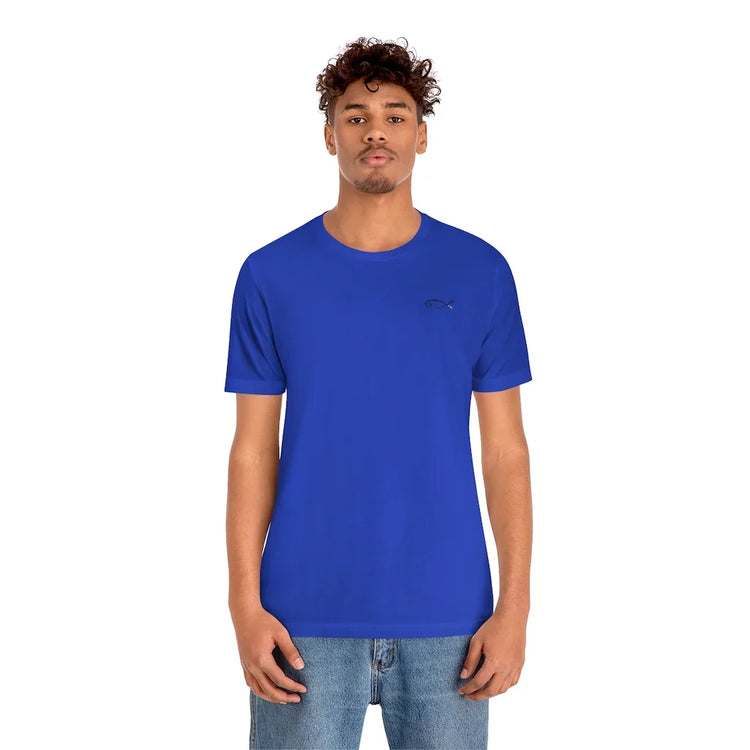 Man wearing blue Christian t-shirt with small ichthys fish symbol, casual faith apparel
