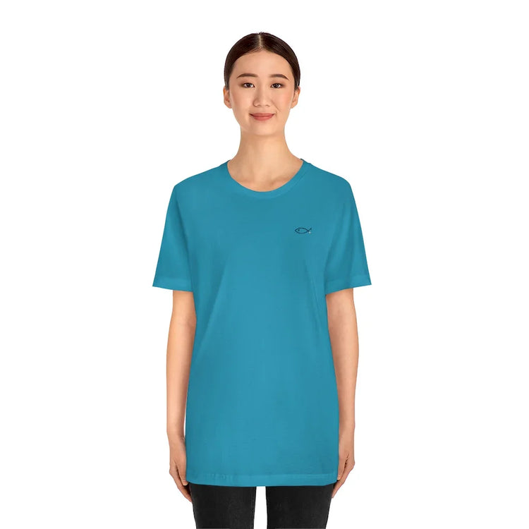 Woman wearing teal Christian fish symbol t-shirt, faith-inspired clothing, white background